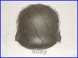 German M40/55 helmet size 66/59, army paint, liner and wire