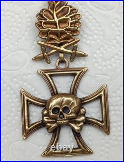 Skull with Iron Cross, oak leaves with swords Skull with Iron Cross, oak leaves with swords