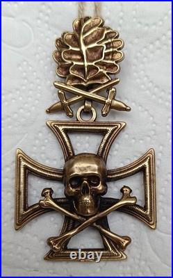 Skull with Iron Cross, oak leaves with swords