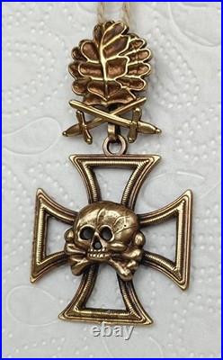 Skull with Iron Cross, oak leaves with swords Skull with Iron Cross, oak leaves with swords