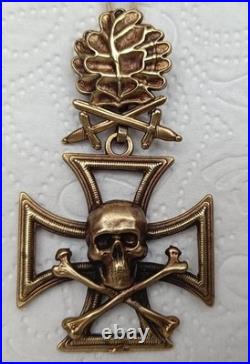 Skull with Iron Cross, oak leaves with swords Skull with Iron Cross, oak leaves with swords
