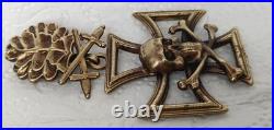 Skull with Iron Cross, oak leaves with swords Skull with Iron Cross, oak leaves with swords