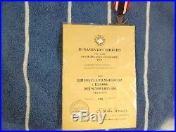 WW2German badge with award document