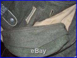 WW2 German M40 uniform kit. Cap, jacket, tunic, trousers with suspenders. Origin