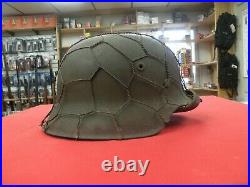 WW2 German M42 Chicken wire helmet nice with camo paint Original