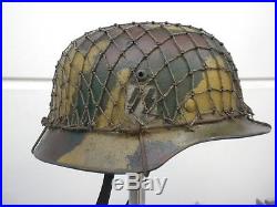 WW2 German helmet m35 double decal camo paint and net (reproduction)