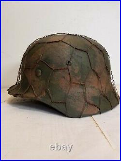 World War II German M35 Camo Painted Aged Chickenwire Helmet