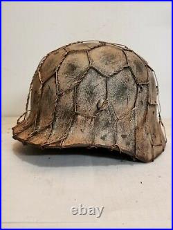 World War II German M35 Camo Painted Aged Winter Chickenwire Helmet